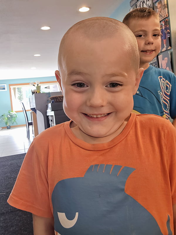 young boys together after a new haircut