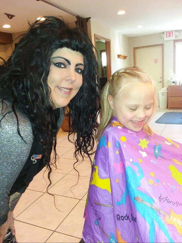 young girl with Alana after a haircut
